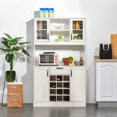 a kitchen area with a microwave, cabinets and countertop space for food preparation or storage