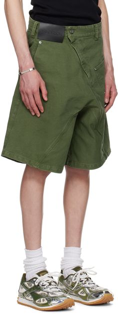 Relaxed-fit wide-leg garment-washed cotton canvas shorts. Fading throughout. · Low-rise · Belt loops · Logo patch at front waistband · Three-pocket styling · Zip-fly · Offset inseams · Logo graphic topstitching at pocket · Hammer loop at outseam Supplier color: Dark green Utility Cotton Bermuda Shorts With Patch Pockets, Relaxed Fit Cotton Shorts With Belt Loops, Relaxed Fit Cotton Bermuda Utility Shorts, Cotton Shorts With Hip Pockets And Wide Leg, Cotton Wide Leg Shorts With Hip Pockets, Green Functional Shorts With Side Pockets, Green Wide Leg Shorts With Pockets, Cotton Utility Bermuda Shorts, Relaxed Fit Cotton Cargo Shorts With Belt Loops