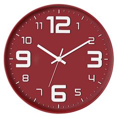 a red wall clock with white numbers on the face is shown in front of a white background