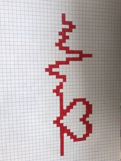 an image of a cross stitched onto a piece of paper with the word love spelled in red