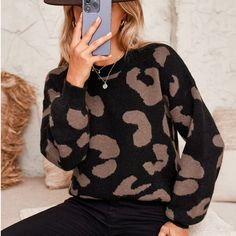 Make a statement with this oversized knit sweater featuring a bold camo print. The relaxed, slouchy silhouette exudes an effortlessly cool vibe, while the eye-catching pattern adds a modern twist to your casual looks. Crafted with a soft knit fabric, this sweater offers both warmth and style. Layer it over your favorite basics for a chic, laid-back ensemble. Product code: CAA06A3J094AG/CAA06A3J094AB/CAA06A3J094KA/CAA06A3J094CH Drop Sleeve Sweater, Trendy Sweater, Oversized Knit Sweater, Drop Sleeve, Trendy Sweaters, Cozy Sweater, Camo Print, Sweater Sleeves, Cozy Sweaters