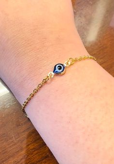 Item Detail  Weight : 1.5 gm Evil Eye : 0.7 cm (Width) Color : Gold Evil Eye Bracelet, Evil eye bead bracelet, evil eye gold chain bracelet, Turkish Evil Eye Bracelet, Bracelet, Bracelet for Women Adjustable Gold Evil Eye Bracelet, Gold Adjustable Evil Eye Bracelet, Adjustable Gold Evil Eye Symbolic Bracelet, Adjustable Gold Charm Bracelet With Evil Eye, Symbolic Evil Eye Bracelets As Gifts, Gold Evil Eye Bracelet With Adjustable Length As Gift, Adjustable Gold Evil Eye Bracelet For Everyday, Adjustable Evil Eye Jewelry For Everyday, Adjustable Evil Eye Spiritual Jewelry