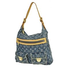 LOUIS VUITTON Buggy GM Shoulder Bag Monogram Denim Leather Blue France M95048       ( - )   SKU ( HG591 OY3  ) 👜DETAILS👜   BRAND LOUIS VUITTON STYLE Shoulder Bag COLOR / MATERIAL Blue/Monogram Denim Canvas Leather   COUNTRY OF MANUFACTURE  France SERIAL NUMBER FL0076 DIMENSION SIZE ( inch ) W  13 x H 13.8 x D 3.9   " (approx.) SIZE ( cm ) W  33 x H 35 x D 10  cm (approx.) HANDLE DROP ( inch /cm ) 0 "/ 0  cm (approx.) SHOULDER DROP ( inch /cm ) 5.9 - 9.1 "/ 15 - 23  cm(approx.) COME WITH ( Accessories)  - POCKETS OUTSIDE Zipper pocket*1,Flap*2 INSIDE Open*1 ※ Example of Ranks✍ S New,Unused SA Less frequently used items A There is a little feeling of used, good condition AB There is a feeling of used, some noticeable scratches and dirt B There is a sense of overall used, there is a dirt an Lv Jeans, Jeans Purse, Louis Vuttion, Jean Purse, Louis Vuitton Keepall, Monogram Bag, Pocket Pattern, Monogrammed Leather, Blue Denim Jeans