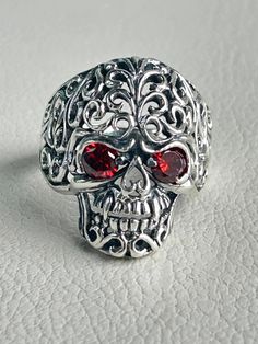 Sterling Silver 925 Skull Ring. Oxidized Biker Ring Solid Design Dimensions: Ring face:  3cm length 3cm Garnet stone 5mm x 5mm Weight:  11.1 grams Hallmarked 925 Skull Wedding Ring Red Men, Ring Man, Biker Men, Biker Rings, Jewelry Website, Stainless Steel Polish, Skull Jewelry, Garnet Stone, Titanium Rings