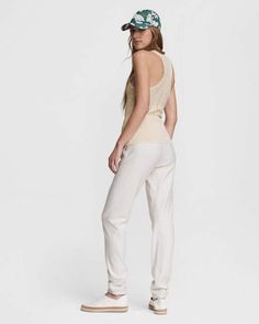 We spun your favorite slim cut workout tank into an elegantly sexy pointelle sweater tank. Athletic silhouette, cotton blend knit. rag & bone Women's Slim Fit Top | Ivory, Large (also in XXS,XS,S,M) Pointelle Sweater, Slim Fit Top, Sweater Tank, Rag And Bone, Summer Accessories, Urban Fashion, Rag & Bone, Workout Tops, Womens Tank