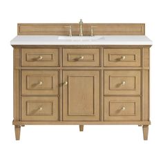 an image of a bathroom vanity with drawers and white counter top on the front side