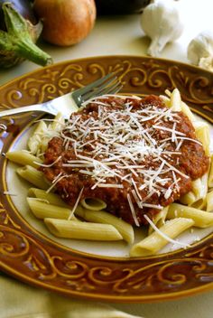 pasta with sauce and cheese on a plate