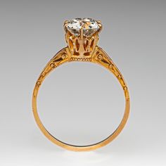 This beautiful diamond solitaire ring is accented with one (1) old European cut diamond weighing 1.50 carats that is set into a six-prong settings. The top half of the ring features engraved details. The ring measures 8.2mm at the top, rises 8.3mm above the finger, tapering to 1.2mm wide and 1.0mm thick at the base of the shank. It is currently a size 6.75. Diamond Engagement Rings Vintage, September Birthstone, European Cut Diamonds, Diamond Solitaire Rings, Vintage Diamond, Diamond Solitaire, Solitaire Ring, High Quality Jewelry, Estate Jewelry