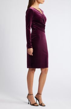 Sultry elegance defines this curve-accentuating dress crafted from rich velvet and topped with a ruched wrap-front bodice. 40" length (size 8) Surplice V-neck Long sleeves Lined 90% polyester, 10% spandex Dry clean Imported Eliza Dress, Dress Crafts, Eliza J, Nordstrom Dresses, Plum, Bodice, Top Brands, Bodycon Dress, Dry Clean