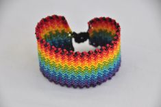 Adjustable handmade rainbow macrame bracelet for man and woman. Perfect to use during summer or winter, day and night. The bracelet is water resistant so you can wear it at the beach. The bracelet has a perfect color combination. This bracelet is not only stunning but also durable, thanks to the waxed cord used. It makes a perfect gift for both Man and Woman. If you have any special request, please, let me know, custom orders are more than welcome. If you would like it longer to wear it as an an Handmade Bohemian Rainbow Friendship Bracelets, Handmade Rainbow Braided Friendship Bracelets, Handmade Rainbow Bracelets For Friendship, Bracelet For Man, Man Bracelet, Crochet Barefoot Sandals, Rainbow Macrame, Soft Sandals, Bracelet Rainbow