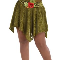 a woman wearing a green skirt with flowers on it