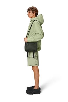 Texel Crossbody Bag is constructed from Rains signature waterproof PU fabric, engineered for carrying strength, durability, and a smooth feel. Practical Waterproof Nylon Shoulder Bag, Sporty Nylon Shoulder Bag With Side Pockets, Waterproof Functional Backpack Shoulder Bag, Green Functional Bags With Side Pockets, Functional Waterproof Shoulder Bag For Commuting, Functional Green Bags With Side Pockets, Functional Waterproof Backpack Shoulder Bag, Functional Waterproof Crossbody Bag, Sporty Waterproof Shoulder Bag For Outdoor