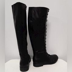 Torrid Black Vegan Leather Knee High Black Boots Lace Up Front And Side Zipper On The Inside. Size 11w These Are Designed Especially For Plus Sized People Or Those With A Big Calf. These Not Only Have A Stretchy Panel In The Back But Are Very Generously Proportioned. Goth Punk Style Like A Pirate Costume For Halloween Or Renfair. Combat Boots Or Moto Boots Style. Note- Pleather. Didn’t Fit Me And Never Worn Out. Measurements On Request. Black Knee-high Faux Leather Combat Boots, Black Wide Calf Knee-high Lace-up Boots, Black Knee-high Lace-up Boots Medium Width, Gothic Black Faux Leather Knee-high Boots, Black Knee-high Combat Boots With Buckle Closure, Big Calves, Black Knee-high Boots With Zipper Closure, Black Knee-high Moto Boots With Zipper Closure, Black Knee High Boots