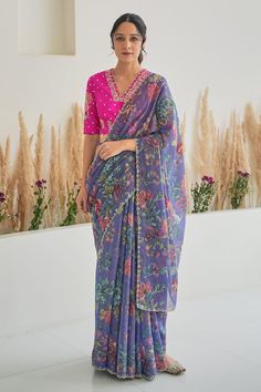 Purple scallop trimmed saree with all over floral blossom prints. Paired with magenta silk blouse with gota, sequins and dabka work. - Aza Fashions Semi-stitched Floral Print Georgette Blouse, Reception Floral Print Georgette Blouse Piece, Multicolor Floral Print Saree For Reception, Festive Floral Print Georgette Blouse Piece, Party Blouse Piece For Diwali With Floral Print, Designer Cotton Silk Saree With Floral Print, Designer Floral Print Cotton Silk Saree, Festive Cotton Silk Saree With Floral Print, Bollywood Style Designer Saree With Floral Print