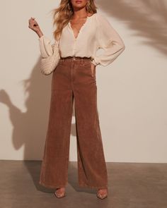 Introducing the Sophia Wide Leg Pants—where romance meets effortless chic. Made from luxe corduroy, these pants drape beautifully with their wide-leg silhouette, offering a blend of sophistication and comfort. The classic 5-pocket styling adds a practical touch while maintaining a polished look. Pair with a delicate blouse for a refined day look or dress up with a statement top for evening allure. Runs large, consider sizing down Corduroy fabric 5-pocket styling Zip fly with button closure 75% C Brown Wide Leg Pants Outfit, Madewell Outfits, Corduroy Pants Outfit, Wide Leg Pants Outfit, Daisy Jones, Fall Pants, Corduroy Fabric, Brown Pants, Pantalon Large