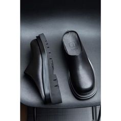 Step into luxury and style with our Opulent LuxeLeather Business Beach Slippers. Crafted with genuine cow leather and pigskin lining, these brogue slippers exude sophistication. The slip-on design and rubber outsole provide comfort and ease, while the 5.5cm heel adds a touch of elegance. Elevate your footwear collection with these opulent slippers today. Experience the epitome of luxury and style with our Opulent LuxeLeather Business Beach Slippers. Crafted with genuine cow leather and pigskin lining, these brogue slippers exude sophistication. Slip into comfort and ease with the slip-on design and rubber outsole, while the 5.5cm heel adds a touch of elegance. Elevate your footwear collection with these opulent slippers today. Indulge in the ultimate luxury and style with our Opulent LuxeL Black Slip-on Platform Slippers, Leather Slip-ons With Leather Footbed, Black Leather Flat Platform Slippers, Leather Slip-ons With Textured Sole, Comfortable Black Leather Platform Slippers, Black Leather Platform Slippers With Leather Sole, Black Leather Platform Slippers With Leather Footbed, Black Slip-on Platform Slippers With Rubber Sole, Black Platform Slippers With Leather Footbed