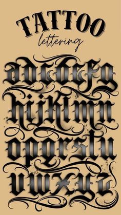 an old fashioned tattoo font with black ink