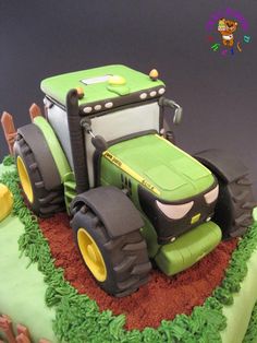 there is a cake made to look like a tractor