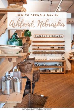 the inside of a store with wooden shelves and baskets