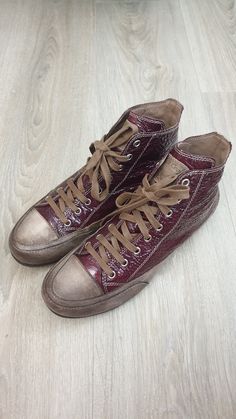 Candice Cooper made in Italy  RARE Top luxury women's high top sport shoes  Very high quality  Excellent condition  Very special and very soft patent leather with very special color purple/burgundy  Corners and nose genuine leather, old fashion brown color  Very lightweight and comfortable  Size EU-39 Insole length 25cm/ 9,3/4inches Insole width 8.5cm/ 3,3/8inches High top 10cm/ 3,7/8inches Casual Patent Leather High-top Lace-up Sneakers, Casual Patent Leather High-top Sneakers With Round Toe, Leather High-top Sneakers With Rubber Sole In Purple, Patent Leather High-top Sneakers With Branded Insole, Purple Burgundy, Old Fashion, Sneakers Athletic, Luxury Women, High Top