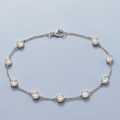 Ross-Simons - 2.20ct t. w. Bezel-Set Cubic Zirconia Station Bracelet in Silver. 7". A bezel-set CZ station bracelet is the perfect versatile piece you'll wear again and again. Ours boasts 2.20 ct. t. w. bezel-set CZs in polished sterling silver. Delicate and dainty on its own, it provides a bit of visual interest and dimension when mixed into a stack of chunky bangles. The fabulous price can be our little secret! Cable chain. Lobster clasp, CZ bracelet. CZ weights are diamond equivalents. Chunky Bangles, Station Bracelet, Cz Bracelet, Floral Bracelet, Circle Pendant Necklace, Butterfly Bracelet, Cz Jewelry, Cz Stud Earrings, Station Necklace