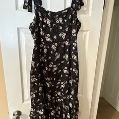 New With Tags, Worn One Time. Black Floral Print Midi Dress For Vacation, Black Floral Print Sundress For Party, Black Floral Print Party Sundress, Black Floral Midi Dress For Day Out, Black Knee-length Sundress, Elegant Black Floral Sundress, Black Midi Sundress For Brunch, Black Midi Sundress For Day Out, Black Floral Print Sundress