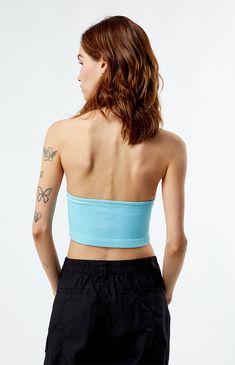 Introducing the Seamless Scoop Halter Top from Est. PAC 1980, crafted from seamless ribbed fabric for a sleek and comfortable fit. With its flattering scoop neckline, chic open-back design, and cropped fit, this top adds effortless style to any ensemble.


	Seamless ribbed fabric
	Good stretch
	Scoop neckline
	Fixed halter strap
	Open back design
	Cropped length
	Fitted
	94% polyamide, 6% elastane
	Hand wash
	Model is wearing a size small Blue Fitted Seamless Tank Top, Fitted Blue Tank Top With Seamless Construction, Blue Seamless Tank Top For Spring, Blue Ribbed Scoop Neck Top, Fitted Seamless Light Blue Crop Top, Light Blue Fitted Seamless Crop Top, Fitted Light Blue Seamless Crop Top, Fitted Blue Top With Seamless Design, High Stretch Seamless Blue Crop Top