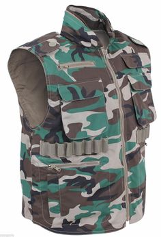 ranger vest tactical woodland camouflage hunting vest hood camo rothco 6555 POLY/COTTON MATERIAL 8 FRONT HOOK & LOOP AND ZIPPERED POCKETS REAR GAME BAG WITH HOOK & LOOP CLOSURE SHELL LOOPS ZIPPERED COLLAR w/HOOD AVAILABLE IN SIZES: S - XL(6551) AND 2X(6552) Ranger Vest - Size Chart   XS S M L XL 2XL 3XL 4XL 5XL Chest 33"-37" 37"-41" 41"-45" 45"-49" 49"-53" 53"-57" Height " Military Style Khaki Vest For Outdoor Activities, Khaki Military Vest For Outdoor Activities, Military Style Vest For Hiking, Military Sleeveless Vest For Hiking, Sleeveless Military Vest For Hiking, Tactical Sleeveless Vest For Outdoor, Military Gear Tactical, Hunting Vest, Medical Gifts