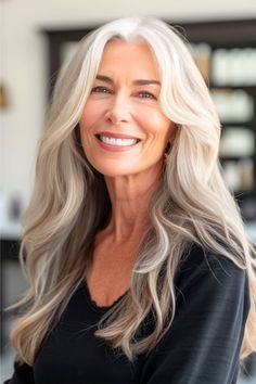 Lastly, we have a hairstyle of beautiful silver waves, combining the allure of natural gray with the softness of a wavy texture. This style radiates a sense of confidence and grace, embodying a chic and contemporary look. Click here to see more stunning long hairstyles for women over 60. Long Grey Hair, Mode Over 50, Silver Haired Beauties, Gorgeous Gray Hair, Grey Hair Inspiration, Silver Hair Color, Silver Grey Hair, Long Gray Hair