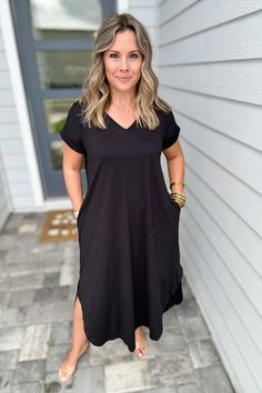 Wait until you feel how buttery soft this maxi dress is. Features a v-neckline, side slits and pockets. Model is 5'3" wearing a small 94% poly 6% Spandex hand wash or dry clean made in the USA! Fitted Black Cotton T-shirt Dress, Black Relaxed Fit T-shirt Dress With Short Sleeves, Sweet Grace, Ruffle Sleeve Dress, Graphic Tee Dress, Capri Blue, Solid Dress, Skirt Leggings, Tee Dress