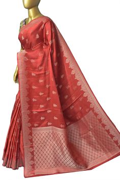 Just add a timeless and elegant Banarasi weave, with a body woven in delicate silver zari buttas which is a treat for sore eyes. The intricate silver zari border adds further magic to this quintessential saree. Comes with colored tassels in alternate formations to add a bling to the look. Color: A shade of rust red color Technique: Amazing silver zari work in a butta pattern and the self-border with silver zari weaving Fabric: Satin Silk Silver Chanderi Traditional Wear For Eid, Silver Banarasi Silk Traditional Wear With Self Design, Silver Blouse Piece With Traditional Drape For Eid, Silver Art Silk Saree For Eid, Silver Wedding Traditional Handloom Wear, Silver Raw Silk Blouse With Traditional Drape, Silver Chanderi Handloom Traditional Wear, Semi-stitched Silver Traditional Wear With Zari Weaving, Silver Art Silk Blouse Piece