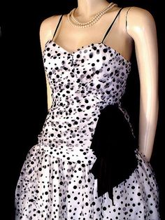 EASY LAYAWAY IS AVAILABLE Original Price $189.99 AN ADORABLE VINTAGE BUBBLE BALLOON DRESS IN BLACK & WHITE WITH VELVET FLOCKED DOTS BY NANCY BRACCOLONI FOR BRACCOLONI THE TULLE SWEETHEART BODICE IS RUCHED & DRAPED FOR A HUGE LOOKING BUSTLINE WITH BLACK VELVET FLOCKED DOTS - THERE ARE TINY STRAPS WHICH COULD BE TUCKED INSIDE IF YOU WANTED A STRAPLESS LOOK BIG FABRIC HEAVY SATIN BOW ON THE SIDE - BIG PUFFY FULL SKIRT IS LINED WITH A SILKY FABRIC WITH A CRINOLINE INSIDE FOR FULLNESS & I Vintage Dress 60s, Lace Nightgown, Balloon Dress, 60s Dress, Sweetheart Neck, Dot Dress, Flocking, Night Gown, Halter Dress