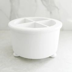 a white container sitting on top of a table