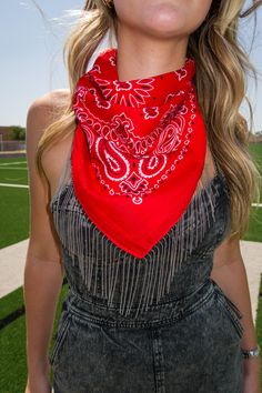 Elevate your accessory game with our Go! Fight! Win! Chain Fringe Bandana. This unique piece is the elevated version of a classic bandana. The vibrant red color and delicate chain fringe create a captivating look that's perfect for adding a stylish twist to your outfit. This bandana can be worn around your neck, head, and waist! - 100% cotton - one size fits most Adjustable Red Bandana For Summer, Red Fringe Summer Jewelry, Red Fringe Jewelry For Summer, Red Bohemian Bandana For Summer, Trendy Red Festival Jewelry, Red Bandana For Summer Festivals, Adjustable Red Bandana, Casual Red Bandana For Festivals, Trendy Red Scarves For Gifts