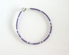 Purple bracelet, purple and silver beaded bracelet, seed bead bracelet, dainty purple bracelet, anklet, ankle bracelet, violet, one strand❤ SIZESThis item comes in several sizes. Kindly choose at checkout. The standard size for an average woman is 7”. For a child, a 6” would be appropriate. I recommend you measure your wrist to determine the best fit.❤ PROCESSING AND SHIPPINGMost orders are made and shipped out in one business day. Please check delivery timeframes for your location on the descri Small Beaded Bracelets Purple, Dainty Purple Beaded Bracelets With Round Beads, Dainty Purple Beaded Bracelet With Round Beads, Dainty Purple Beaded Bracelet, Lavender Beaded Bracelets With Tiny Round Beads, Dainty Purple Jewelry With Tiny Beads, Summer Jewelry Diy, Bracelet Violet, Purple Beaded Necklace