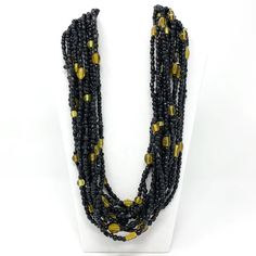 27 Black Glass Bead Necklace with Yellow Beads Insert Black Oval Beaded Necklaces, Black Beaded Necklaces With Colorful Beads For Spiritual Use, Black Jewelry With Colorful Oval Beads, Black Necklace With Colorful Oval Beads, Black Necklaces With Colorful Oval Beads, Black Spiritual Beaded Necklace With Colorful Beads, Spiritual Black Beaded Necklaces With Colorful Beads, Spiritual Black Beaded Necklace With Colorful Beads, Multi-strand Black Beads For Party