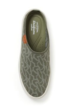 A shock-absorbing rubber sole and arch support ensure comfort in this sneaker with an easy on/off profile for on-the-go styling. Removable, cushioned insole with arch support Textile upper and lining/rubber sole Imported Casual Slip-ons With Rubber Sole For Light Sports, Casual Ergonomic Slip-on Sneakers With Arch Support, Casual Green Slip-resistant Sneakers, Casual Lightweight Slip-on Sneakers With Slip-resistant, Casual Ergonomic Slip-ons With Arch Support, Comfortable Green Slip-ons With Cushioned Footbed, Lightweight Casual Slip-ons With Ortholite Insole, Lightweight Casual Walking Shoes For Light Sports, Casual Green Breathable Slip-on Sneakers