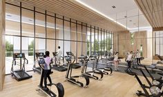 an artist's rendering of a gym with treadmills and exercise machines in the foreground