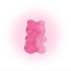 a pink gummy bear on a white background