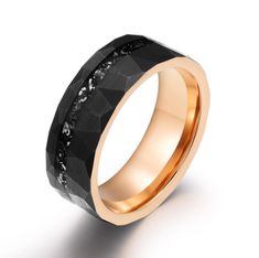 black and gold wedding ring with white diamonds