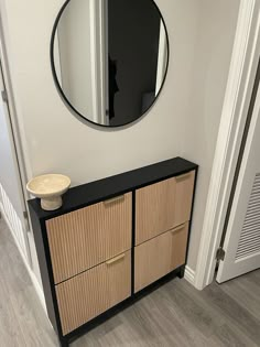 a bathroom with a sink and mirror on the wall