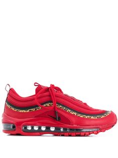 Red leather Air Max 97 sneakers from Nike featuring a round toe, a lace up detail, a leopard print, a logo patch at the tongue, a branded insole, a pull tab at the rear, side logo branding and chunky rubber sole.