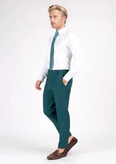 Boldly refined and fashion forward, the Diamantia Teal Stretch Pants are crafted from unique stretch cotton fabric for extra comfort in an eye-catching and polished color that's sure to get attention. Green 4-way Stretch Elastane Pants, Green Elastane Trousers, Green Elastane Pants With 4-way Stretch, Green Stretch Elastane Pants, Green Slim Fit Trousers, Straight Cotton Pants With 4-way Stretch, Full Length Cotton Pants With 4-way Stretch, Green Full-length Pants For Business Casual, Green Business Casual Full-length Pants