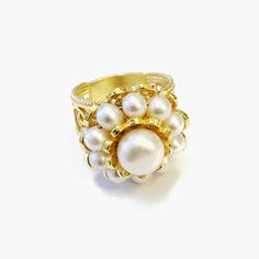 Double Layer Pearl 14K Gold Ring 925 Sterling Exceptionally Beautiful Design Pearl Ring, Feminine Ring, Valentine Gift Boxed, Mom's Gift Ring. IT WEIGHTS APPROXIMATELY 10 GR. 4-5 mm Pearls surround Center : 10 mm Round pearl for a feminine artistic look.. Made in an artisan workshop by an artist with 20+ Years experience. This a very Victorian, Artistic Ring that has sold out many times in England, Italy, Germany and the US. The Filigree band is tapered for comfortable wear. This will come in a Luxury Handmade Pearl Ring For Wedding, White Oval Dome Ring For Gift, White Oval Dome Ring Gift, Timeless Pearl Ring Gift, Classic Yellow Gold Flower Ring For Gift, Classic Yellow Gold Flower Ring As Gift, Classic White Dome Ring For Wedding, Elegant White Adjustable Flower Ring, Fine Jewelry Rings With 17 Jewels For Gifts