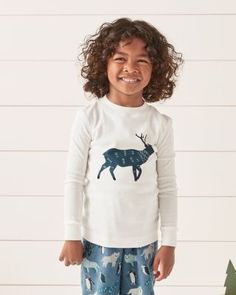 Supersoft in organic Green Cotton, this unisex pajama tee features a vibrant array of exclusive kid-friendly prints. Crew neckline. Long sleeves. Double-layer detail at the neck and cuffs. Low-hip length. 100-percent organic Green Cotton. Wear snug fitting; not flame-resistant. Unisex Pajamas, Garnet Hill, Colby, Kids Sleepwear, Fall Wardrobe, Green Cotton, 100 Percent, Hip Length, Kid Friendly