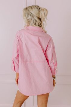 - From office hours to after hours, this chic top will keep you looking stylish! - Unlined material - A collared v-cut neckline featuring a faux pearl button for additional coverage and a pleated detail - ¾ length sleeves with button closure cuffs - A relaxed silhouette that ends in a subtly rounded hemline Feminine Pink Collared Top, Pink V-neck Blouse For Work, Pink Collared Top With Button Closure, Pink Collared Solid Color Blouse, Collared Solid Pink Blouse, Pink Collared Blouse With Solid Color, Pink 3/4 Sleeve Top For Work, Elegant Pink Blouse With 3/4 Sleeves, Pink Spring Blouse For Work