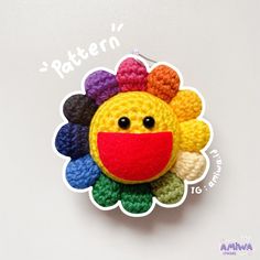 a crocheted sunflower brooch is shown with the words pattern on it