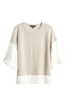 Enjoy a layered look without the effort in this mixed-media top that combines a textured knit with three-quarter balloon sleeves and a curved hem in crepe. 27" length Crewneck Three-quarter sleeves 52% rayon, 48% polyester with 100% polyester contrast Machine wash, dry flat Imported Cream Textured Knit Tops For Layering, Elegant Neutral Tops For Layering, Chic 3/4 Sleeve Tops For Layering, Spring Textured Knit Tops With Balloon Sleeves, Chic Textured Knit Top For Layering, Chic Cream Tops For Layering, Chic Cream Top For Layering, Chic Textured Knit Tops With Balloon Sleeves, Cream Knit Tops For Layering