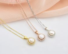 * Stunning handmade solid gold pearl necklace . 14K and 18K options are avaliable. Adorned with tiny beads of white zircon gemstone, used to emphasize the unique design. The necklace has an elegant design in every aspect. It is very stylish and convenient for daily use. You will not be able to take your eyes off the fascinating color of opal stone and the magnificent glitter of solid gold * ★Item Details ♥Made to Order ♥Gold Kt: 14K & 18K ♥Available Gold Color: Gold, Rose Gold, White Gold ♥P Gold Bridal Necklace With Akoya Pearl Pendant, Delicate Pearl Necklace With Round Pendant For Anniversary, Gold Akoya Pearl Bridal Necklace Gift, Yellow Gold Pearl-embellished Necklaces For Wedding, Silver Bridal Necklace With Pearl Pendant For Anniversary, Yellow Gold Pearl Necklaces For Wedding, Round Bridal Necklace With Pearl Pendant For Anniversary, Gold Akoya Pearl Necklace For Wedding, Wedding Jewelry With Pearl Pendant