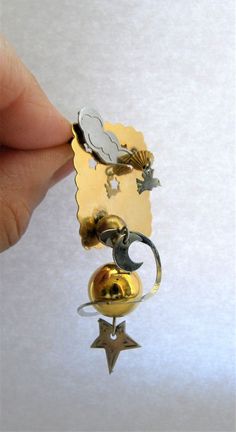 "A fantastic artsy Futuristic kinetic art pin with themes of Earth, Moon Galaxy in gold and silver metal. The gold ball is suspended on soldered wire with a silver ring and moon dangling around it. There is a cloud and bird with cut out stars. Very special and unique artisan pin. In great vintage condition. Measures 2 3/4\" long x 1 1/2\" wide x 3/4\" depth. Very Treky I will ship this item within one business day of receiving payment. Thank you. Enjoy For more Vintage Jewelry see my listings he Handmade Artistic Gold Brooch, Modernist Gold Brooches For Gifts, Gold Galaxy, Arm Bracelets Upper, Fat Art, Vintage Housewares, Mixed Media Jewelry, Kinetic Art, Hand Painted Walls